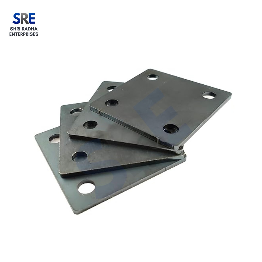 Heavy-duty industrial scaffolding base plate placed on concrete foundation at a B2B construction project site.